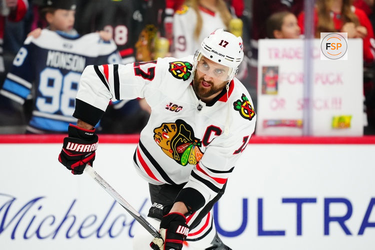 Feb 28, 2026; Denver, Colorado, USA; Chicago Blackhawks left wing Nick Foligno (17) warms up before the game against the Colorado Avalanche at Ball Arena. Credit: Ron Chenoy-Imagn Images