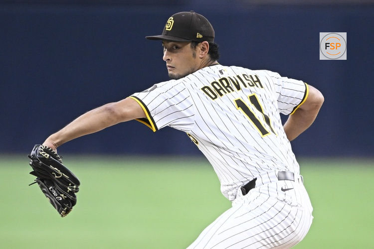 Sep 8, 2025; San Diego, California, USA; San Diego Padres starting pitcher Yu Darvish (11) delivers during the first inning against the Cincinnati Reds at Petco Park. Credit: Denis Poroy-Imagn Images