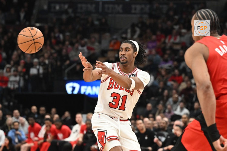 Feb 5, 2026; Toronto, Ontario, CAN;  Chicago Bulls guard Jaden Ivey (31) passes against the Toronto Raptors in the second half at Scotiabank Arena. Credit: Dan Hamilton-Imagn Images