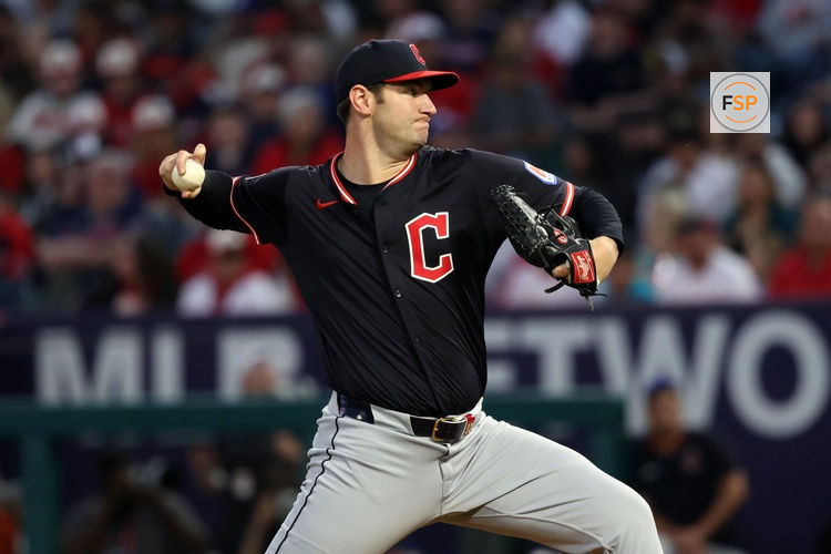 Apr 4, 2025; Anaheim, California, USA;  Cleveland Guardians starting pitcher Gavin Williams (32) pitches during the first inning against the Los Angeles Angels at Angel Stadium. Credit: Kiyoshi Mio-Imagn Images