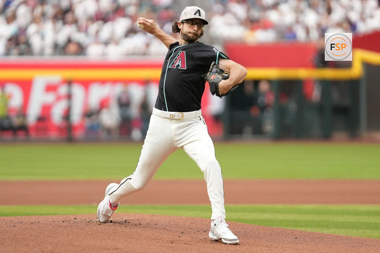 May 17, 2025; Phoenix, Arizona, USA; Arizona Diamondbacks pitcher Zac Gallen (23) pitches against the Colorado Rockies in the first inning at Chase Field. Credit: Jacob Reiner-Imagn Images