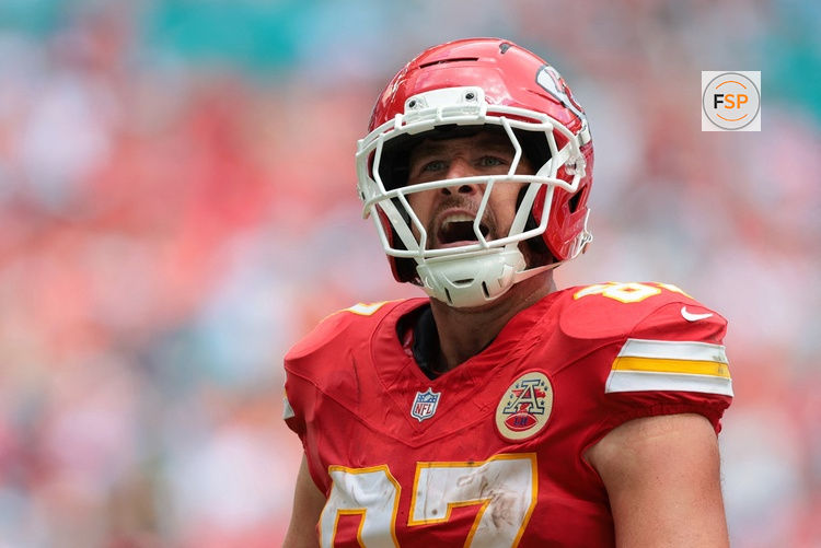 Sep 27, 2026; Miami Gardens, Florida, USA;  Kansas City Chiefs tight end Travis Kelce (87) celebrates after scoring a touchdown against the Miami Dolphins during the fourth quarter at Hard Rock Stadium.  Credit: Sam Navarro-Imagn Images