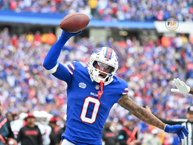 Sep 8, 2024; Orchard Park, New York, USA; Buffalo Bills wide receiver Keon Coleman (0) celebrates after making a catch in the third quarter against the Arizona Cardinals at Highmark Stadium. Credit: Mark Konezny-Imagn Images