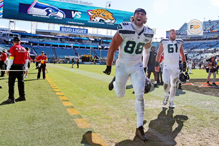 Oct 12, 2025; Jacksonville, Florida, USA; Seattle Seahawks tight end AJ Barner (88) runs off the field after the game against the Jacksonville Jaguars at EverBank Stadium. Credit: Morgan Tencza-Imagn Images