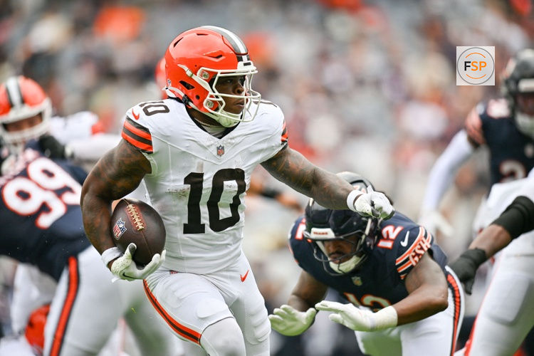 Aug 15, 2026; Chicago, Illinois, USA; Cleveland Browns running back Quinshon Judkins (10) runs the ball against Chicago Bears linebacker Devin Bush (12) during the first half at Soldier Field. Credit: Patrick Gorski-Imagn Images