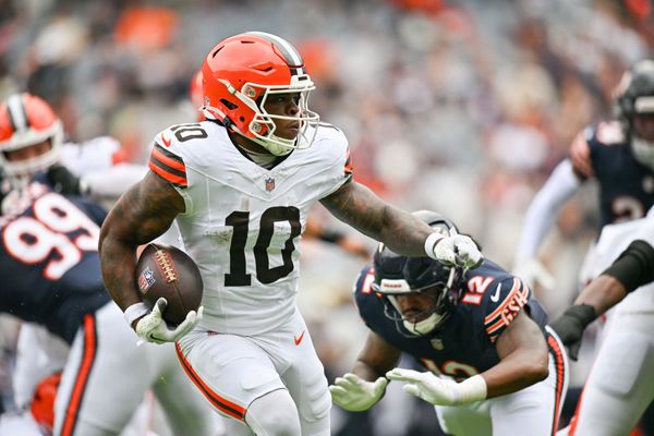 Aug 15, 2026; Chicago, Illinois, USA; Cleveland Browns running back Quinshon Judkins (10) runs the ball against Chicago Bears linebacker Devin Bush (12) during the first half at Soldier Field. Mandatory Credit: Patrick Gorski-Imagn Images