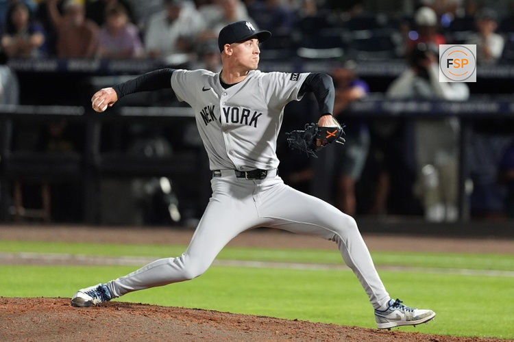 Apr 18, 2025; Tampa, Florida, USA; New York Yankees relief pitcher Luke Weaver (30) throws a pitch against the Tampa Bay Rays during the ninth inning at George M. Steinbrenner Field. Credit: Dave Nelson-Imagn Images