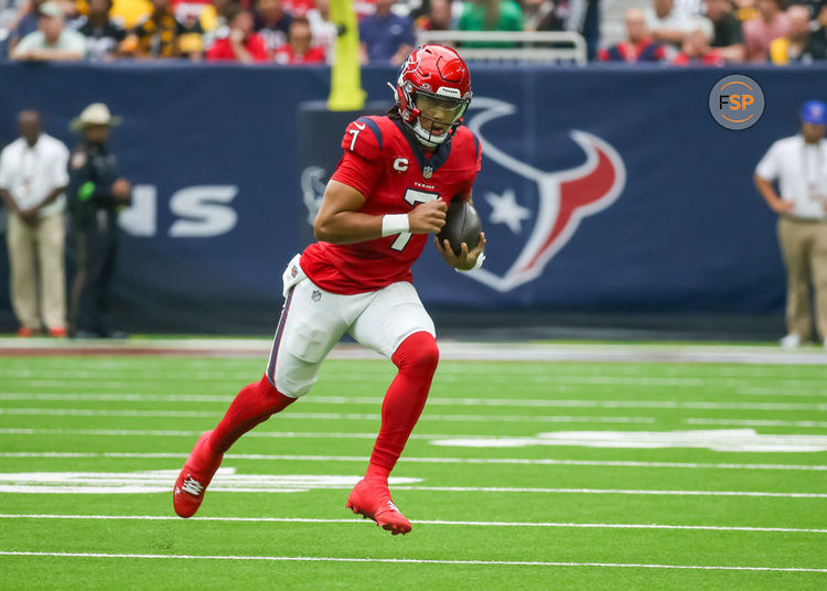 HOUSTON, TX - OCTOBER 01:  Houston Texans quarterback C.J. Stroud (7) carries the ball in the first quarter during the NFL game between the Pittsburgh Steelers and Houston Texans on October 1, 2023 at NRG Stadium in Houston, Texas.  (Photo by Leslie Plaza Johnson/Icon Sportswire)