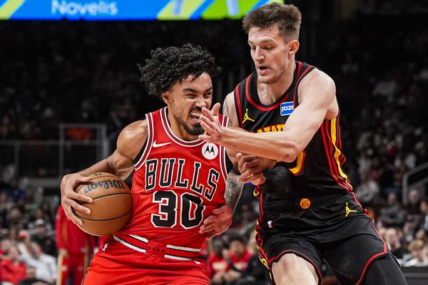 Dec 21, 2025; Atlanta, Georgia, USA; Chicago Bulls guard Tre Jones (30) is defended by Atlanta Hawks guard Vit Krejci (27) during the second half at State Farm Arena. Mandatory Credit: Dale Zanine-Imagn Images