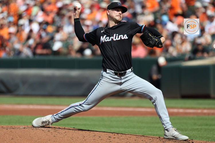 Jul 12, 2025; Baltimore, Maryland, USA; Miami Marlins pitcher Janson Junk (26) throws during the first inning against the Baltimore Orioles at Oriole Park at Camden Yards. Credit: Daniel Kucin Jr.-Imagn Images