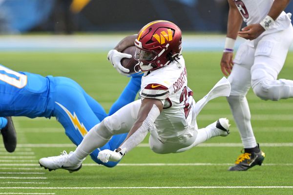 Oct 5, 2025; Inglewood, California, USA; Washington Commanders running back Jacory Croskey-Merritt (22) runs against the Los Angeles Chargers in the second half at SoFi Stadium. Mandatory Credit: Jayne Kamin-Oncea-Imagn Images