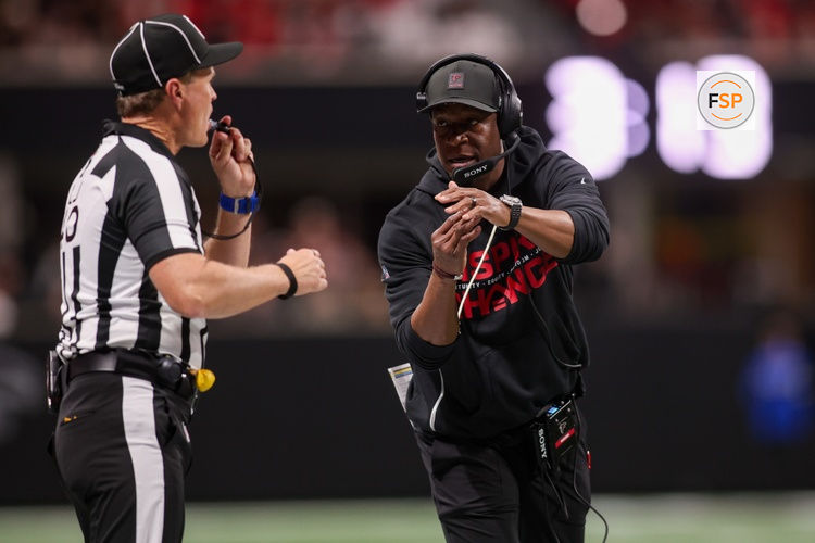 Jan 4, 2026; Atlanta, Georgia, USA; Atlanta Falcons head coach Raheem Morris calls a timeout against the New Orleans Saints in the first quarter at Mercedes-Benz Stadium. Credit: Brett Davis-Imagn Images
