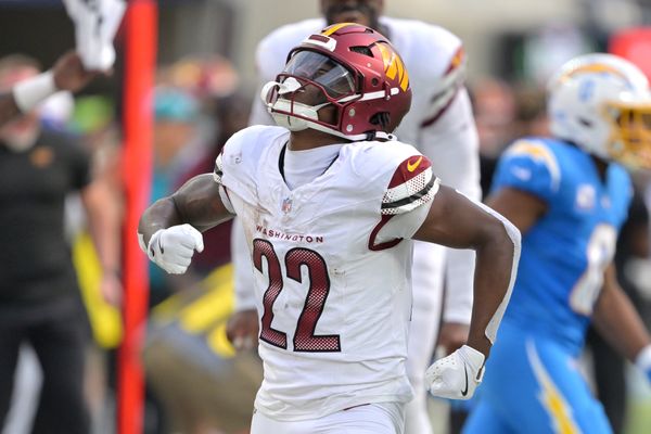Oct 5, 2025; Inglewood, California, USA; Washington Commanders running back Jacory Croskey-Merritt (22) reacts after a first down against the Los Angeles Chargers in the second half at SoFi Stadium. Mandatory Credit: Jayne Kamin-Oncea-Imagn Images