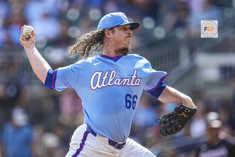 May 23, 2026; Cumberland, Georgia, USA; Atlanta Braves pitcher Grant Holmes (66) pitches against the Washington Nationals during the first inning at Truist Park. Credit: Dale Zanine-Imagn Images