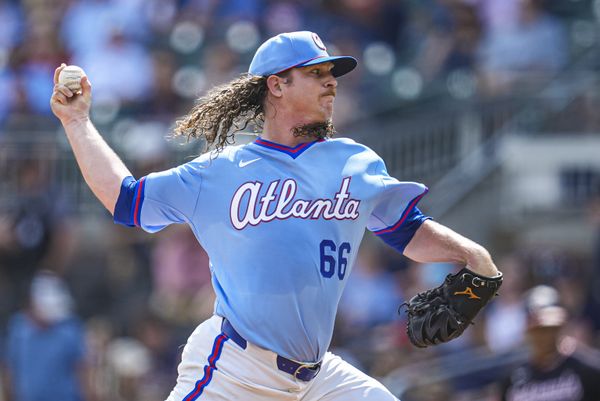 May 23, 2026; Cumberland, Georgia, USA; Atlanta Braves pitcher Grant Holmes (66) pitches against the Washington Nationals during the first inning at Truist Park. Mandatory Credit: Dale Zanine-Imagn Images