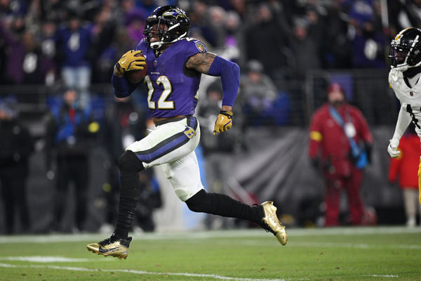 Jan 11, 2025; Baltimore, Maryland, USA; Baltimore Ravens running back Derrick Henry (22) runs to score a touchdown against the Pittsburgh Steelers in the third quarter in an AFC wild card game at M&T Bank Stadium. Mandatory Credit: Tommy Gilligan-Imagn Images