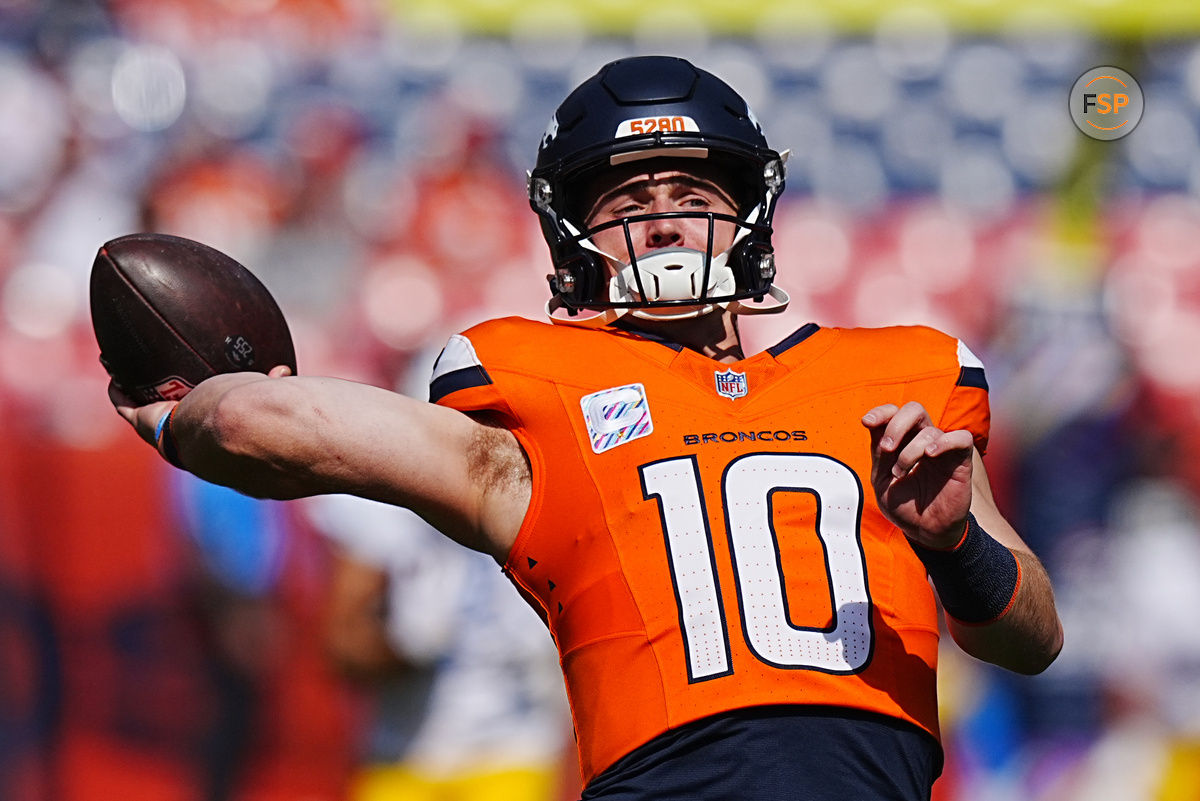 Oct 13, 2024; Denver, Colorado, USA; Denver Broncos quarterback Bo Nix (10) warms up before the game against the Los Angeles Chargers at Empower Field at Mile High. Credit: Ron Chenoy-Imagn Images