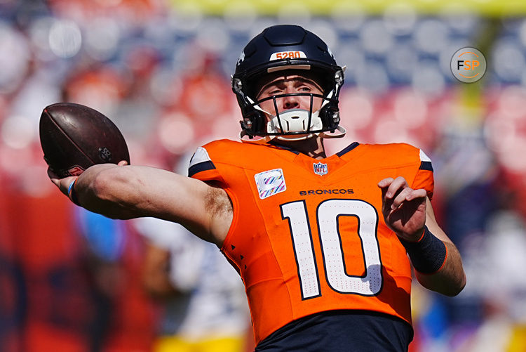 Oct 13, 2024; Denver, Colorado, USA; Denver Broncos quarterback Bo Nix (10) warms up before the game against the Los Angeles Chargers at Empower Field at Mile High. Credit: Ron Chenoy-Imagn Images