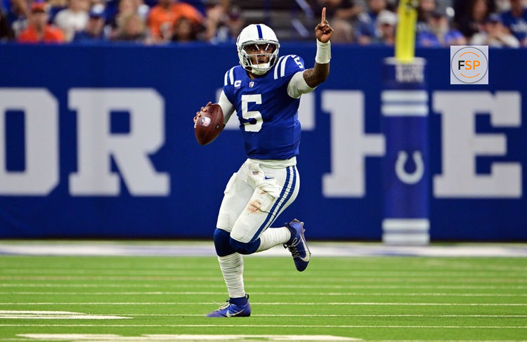 Sep 22, 2024; Indianapolis, Indiana, USA; Indianapolis Colts quarterback Anthony Richardson (5) holds up the one finger while running the ball during the second half against the Chicago Bears at Lucas Oil Stadium. Credit: Marc Lebryk-Imagn Images

