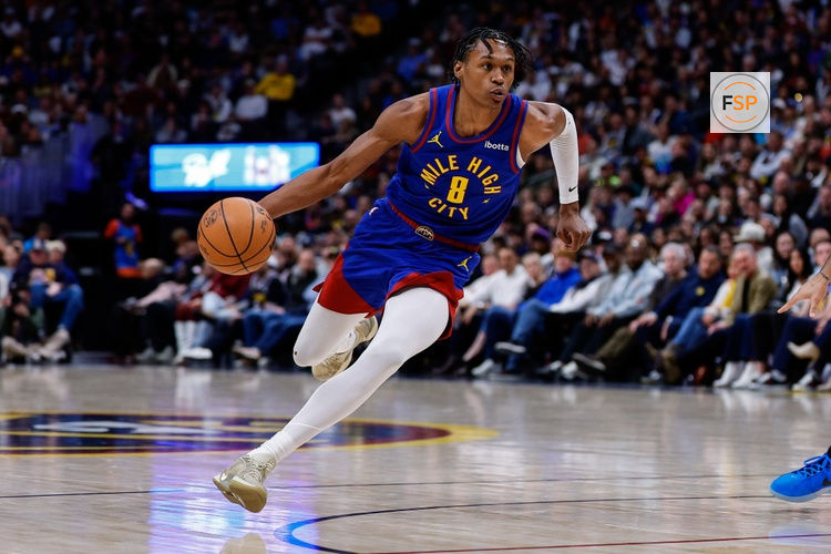 Feb 1, 2026; Denver, Colorado, USA; Denver Nuggets guard Peyton Watson (8) controls the ball in the third quarter against the Oklahoma City Thunder at Ball Arena. Credit: Isaiah J. Downing-Imagn Images