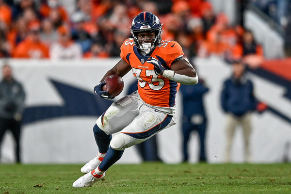 DENVER, CO - DECEMBER 12: Denver Broncos running back Javonte Williams (33) carries the ball during a game between the Denver Broncos and the Detroit Lions at Empower Field at Mile High on December 12, 2021 in Denver, Colorado. (Photo by Dustin Bradford/Icon Sportswire)