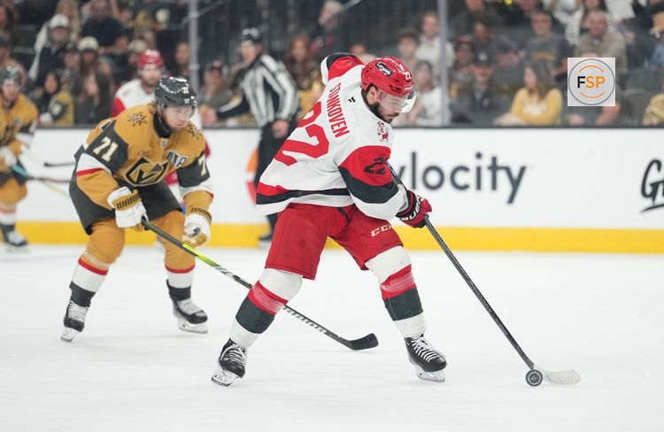 Jun 9, 2026; Las Vegas, Nevada, USA; Carolina Hurricanes center Logan Stankoven (22) carries the puck in front of Vegas Golden Knights center William Karlsson (71) during the 1st period in game four of the 2026 Stanley Cup Final at T-Mobile Arena. Credit: Lucas Peltier-Imagn Images