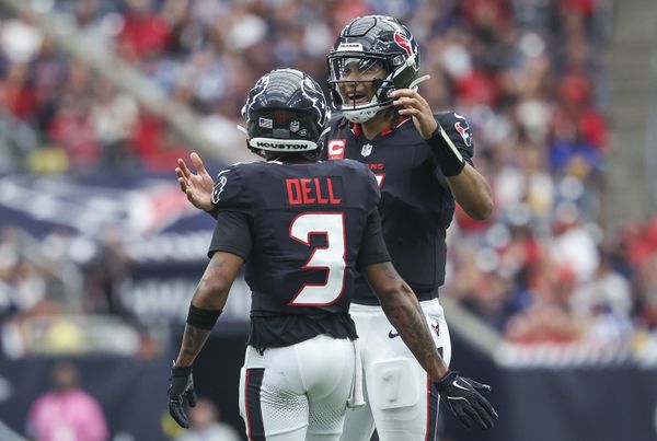 Oct 27, 2024; Houston, Texas, USA; Houston Texans quarterback C.J. Stroud (7) and wide receiver Tank Dell (3) react after a play during the fourth quarter against the Indianapolis Colts at NRG Stadium. Mandatory Credit: Troy Taormina-Imagn Images