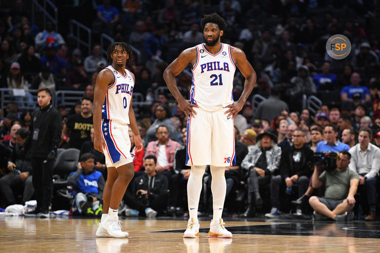 LOS ANGELES, CA - JANUARY 17: Philadelphia 76ers Center Joel Embiid (21) and Philadelphia 76ers Guard Tyrese Maxey (0) look on during a NBA game between the Philadelphia 76ers and the Los Angeles Clippers on January 17, 2023 at Crypto.com Arena in Los Angeles, CA. (Photo by Brian Rothmuller/Icon Sportswire)