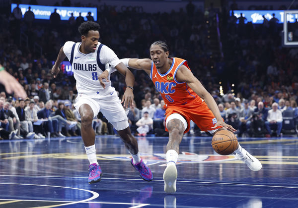 Dec 10, 2024; Oklahoma City, Oklahoma, USA; Oklahoma City Thunder forward Jalen Williams (8) drives to the basket beside Dallas Mavericks forward Olivier-Maxence Prosper (8) during the second quarter at Paycom Center. Mandatory Credit: Alonzo Adams-Imagn Images