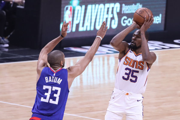 LOS ANGELES, CA - APRIL 20: Phoenix Suns forward Kevin Durant (35) shoots over LA Clippers forward Nicolas Batum (33) during the Phoenix Suns game versus the Los Angeles Clippers in Game 3 of the West 1st Round on April 20, 2023, at Crypto.com Arena in Los Angeles, CA. (Photo by Jevone Moore/Icon Sportswire)