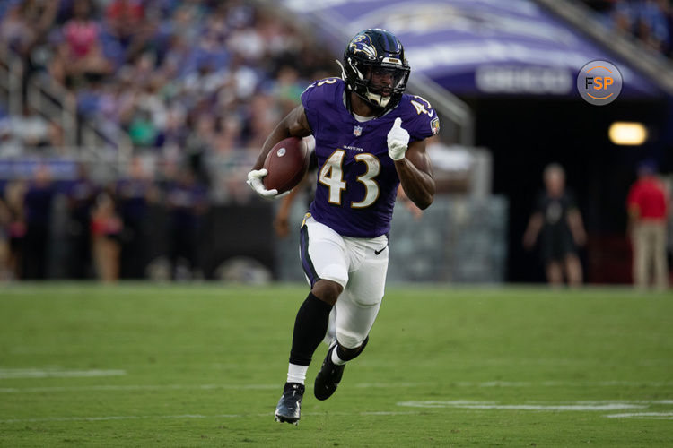 BALTIMORE, MD - AUGUST 12: Baltimore Ravens running back Justice Hill (43) sprints down the sideline during an NFL pre-season game between the Philadelphia Eagles and the Baltimore Ravens on August 12, 2023, at M&T Bank Stadium in Baltimore, Maryland. (Photo by Charles Brock/Icon Sportswire)