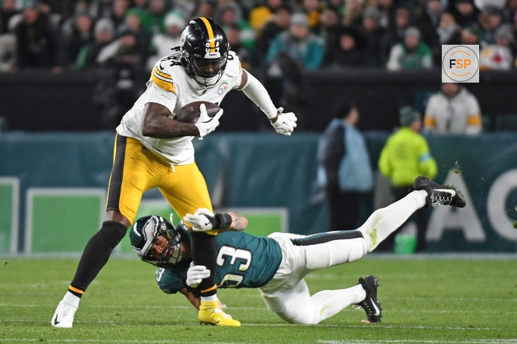 Dec 15, 2024; Philadelphia, Pennsylvania, USA; Pittsburgh Steelers running back Cordarrelle Patterson (84) is tackled by Philadelphia Eagles linebacker Zack Baun (53) during the third quarter at Lincoln Financial Field. Credit: Eric Hartline-Imagn Images