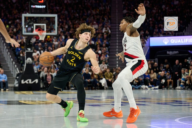 Nov 21, 2025; San Francisco, California, USA; Golden State Warriors guard Brandin Podziemski (2) looks to shoot the ball against Portland Trail Blazers guard Caleb Love (2) during the third quarter at Chase Center. Credit: Robert Edwards-Imagn Images