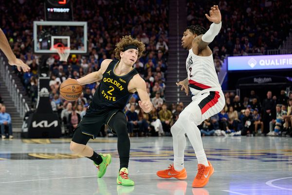Nov 21, 2025; San Francisco, California, USA; Golden State Warriors guard Brandin Podziemski (2) looks to shoot the ball against Portland Trail Blazers guard Caleb Love (2) during the third quarter at Chase Center. Mandatory Credit: Robert Edwards-Imagn Images