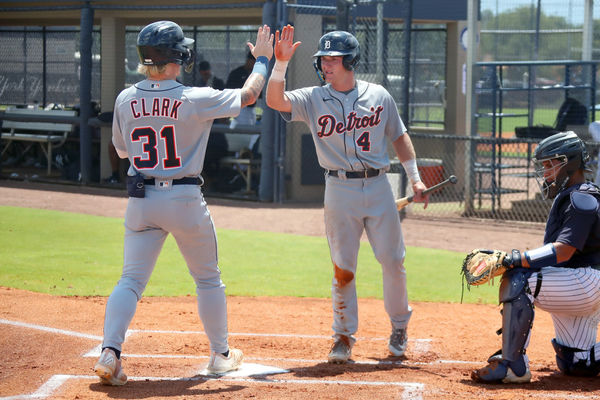 Tampa, FL - AUG 14: Detroit Tigers Outfielders Max Clark (31) & Kevin McGonigle (4) high five one another at home plate during the MiLB Florida Complex League (rookie) regular season game between the FCL Tigers and the FCL Yankees on August 14, 2023, at Yankees Minor League Complex in Tampa, FL. (Photo by Cliff Welch/Icon Sportswire)