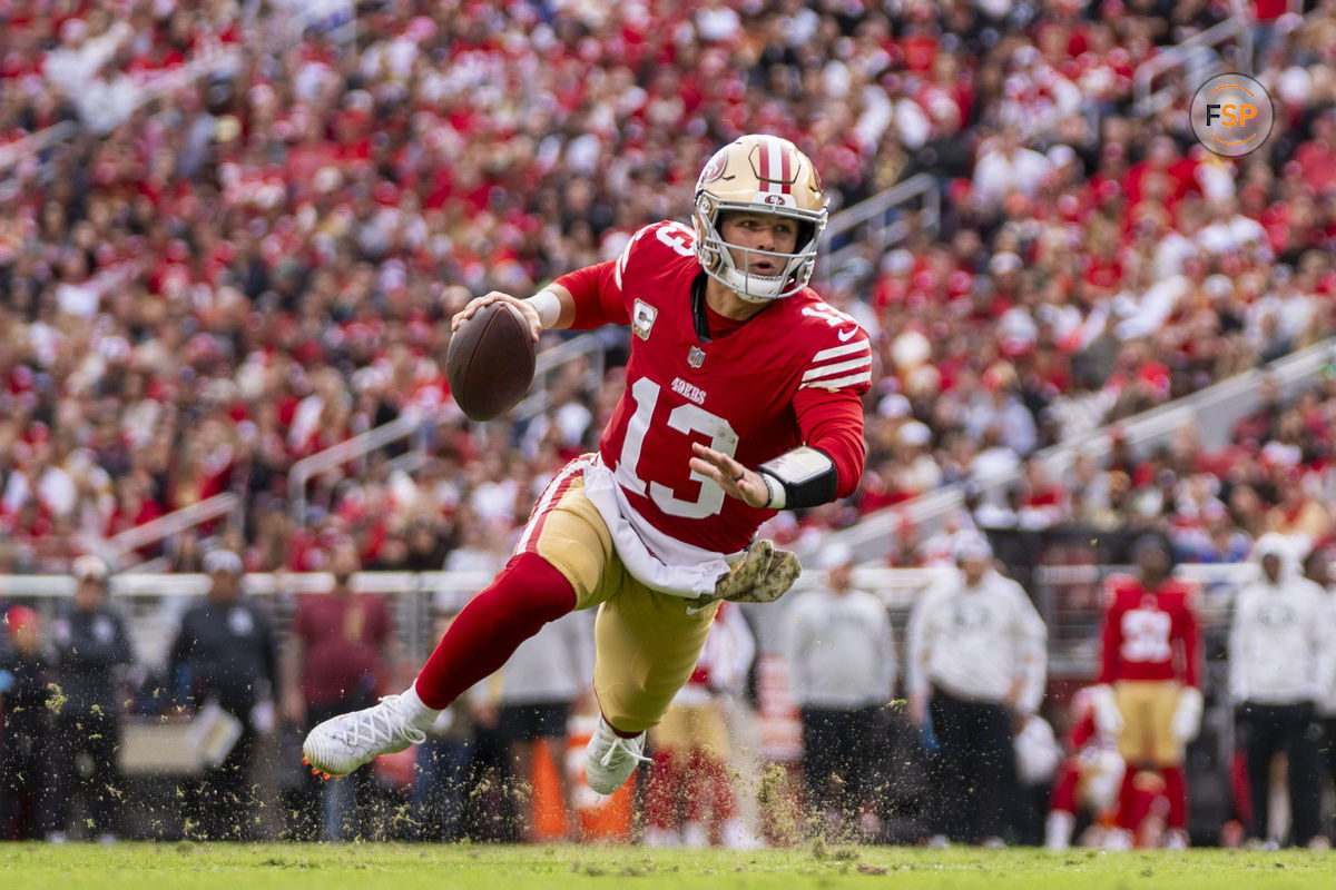 November 17, 2024; Santa Clara, California, USA; San Francisco 49ers quarterback Brock Purdy (13) runs the football against the Seattle Seahawks during the first quarter at Levi's Stadium. Credit: Kyle Terada-Imagn Images