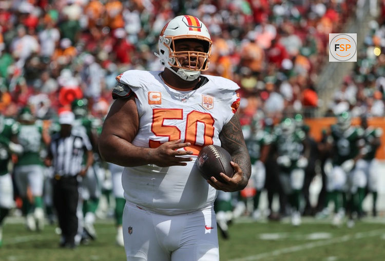 Sep 21, 2025; Tampa, Florida, USA; Tampa Bay Buccaneers defensive tackle Vita Vea (50) recovers the fumble against the New York Jets during the second quarter at Raymond James Stadium. Credit: Kim Klement Neitzel-Imagn Images