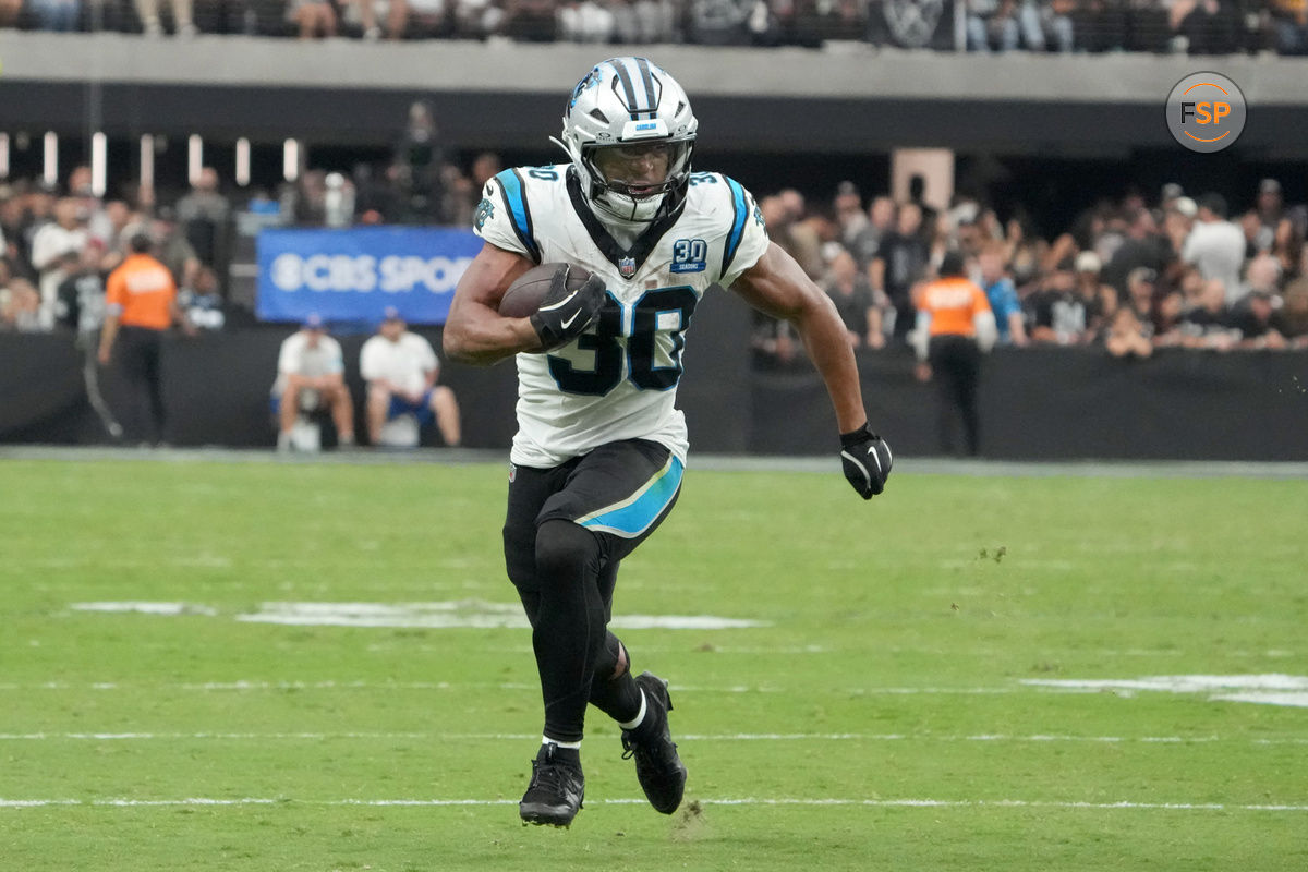 Sep 22, 2024; Paradise, Nevada, USA; Carolina Panthers running back Chuba Hubbard (30) carries the ball against the Las Vegas Raiders at the second half at Allegiant Stadium. Credit: Kirby Lee-Imagn Images