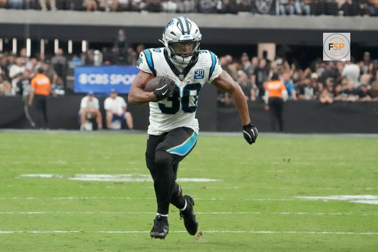 Sep 22, 2024; Paradise, Nevada, USA; Carolina Panthers running back Chuba Hubbard (30) carries the ball against the Las Vegas Raiders at the second half at Allegiant Stadium. Credit: Kirby Lee-Imagn Images