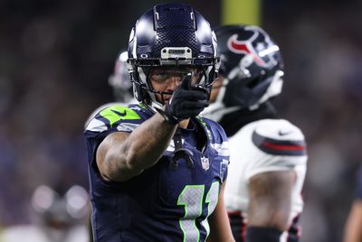 Oct 20, 2025; Seattle, Washington, USA; Seattle Seahawks wide receiver Jaxon Smith-Njigba (11) celebrates after a first down during the third quarter against the Houston Texans at Lumen Field. Mandatory Credit: Kevin Ng-Imagn Images