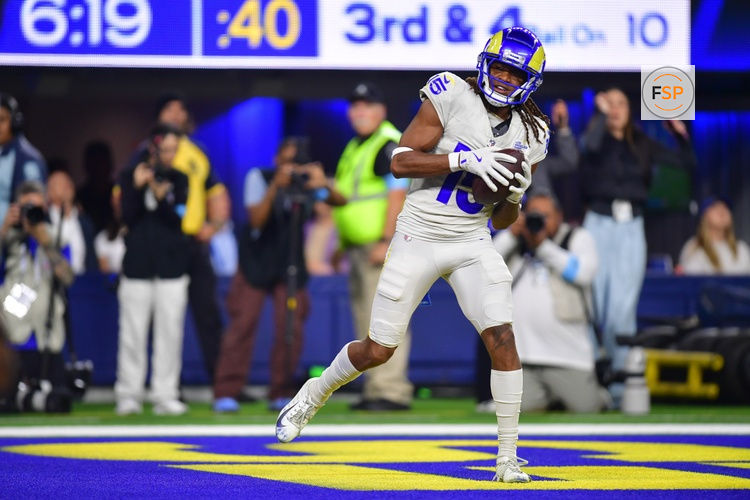 Oct 24, 2024; Inglewood, California, USA; Los Angeles Rams wide receiver Demarcus Robinson (15) scores a touchdown against the Minnesota Vikings during the second half at SoFi Stadium. Credit: Gary A. Vasquez-Imagn Images