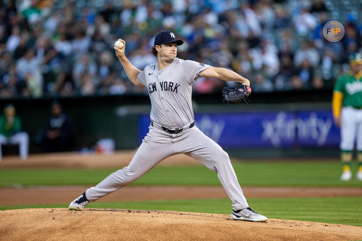 Sep 20, 2024; Oakland, California, USA; New York Yankees pitcher Gerrit Cole (45) throws a pitch during the first inning against the Oakland Athletics at Oakland-Alameda County Coliseum. Credit: Bob Kupbens-Imagn Images