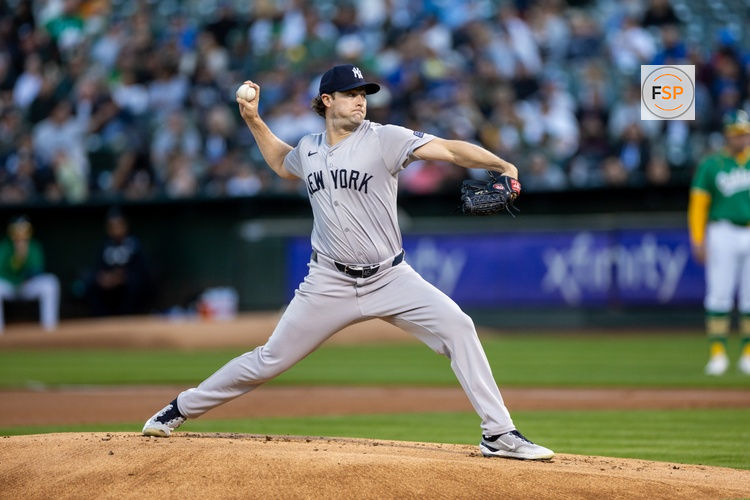 Sep 20, 2024; Oakland, California, USA; New York Yankees pitcher Gerrit Cole (45) throws a pitch during the first inning against the Oakland Athletics at Oakland-Alameda County Coliseum. Credit: Bob Kupbens-Imagn Images