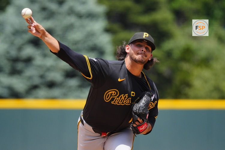 Jun 21, 2026; Denver, Colorado, USA; Pittsburgh Pirates starting pitcher Jared Jones (17) delivers a pitch in the first inning against the Colorado Rockies at Coors Field. Credit: Ron Chenoy-Imagn Images