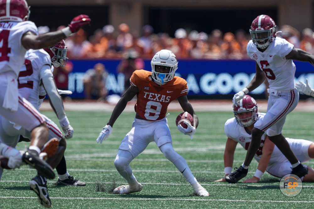 AUSTIN, TX - SEPTEMBER 10: Texas Longhorns wide receiver Xavier Worthy (8) runs the ball during the game between the Alabama Crimson Tide and the Texas Longhorns on September 10, 2022, at Darrell K Royal-Texas Memorial Stadium in Austin, Texas.  (Photo by Daniel Dunn/Icon Sportswire)