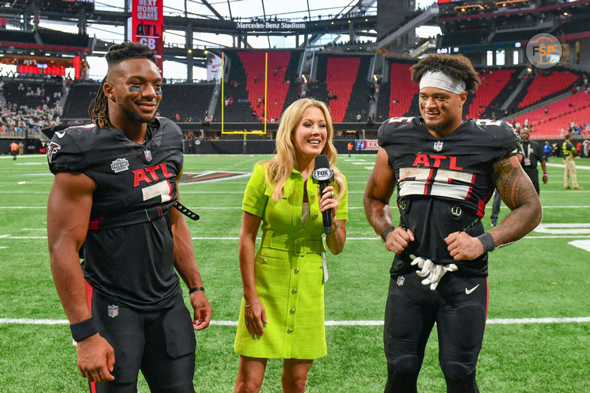 ATLANTA, GA – SEPTEMBER 10:  Atlanta running back Bijan Robinson (7) and running back Tyler Allgeier (25) are interviewed following the conclusion of the NFL game between the Carolina Panthers and the Atlanta Falcons on September 10th, 2023 at Mercedes-Benz Stadium in Atlanta, GA.  (Photo by Rich von Biberstein/Icon Sportswire)