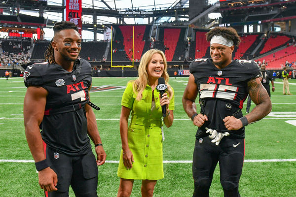 ATLANTA, GA – SEPTEMBER 10:  Atlanta running back Bijan Robinson (7) and running back Tyler Allgeier (25) are interviewed following the conclusion of the NFL game between the Carolina Panthers and the Atlanta Falcons on September 10th, 2023 at Mercedes-Benz Stadium in Atlanta, GA.  (Photo by Rich von Biberstein/Icon Sportswire)