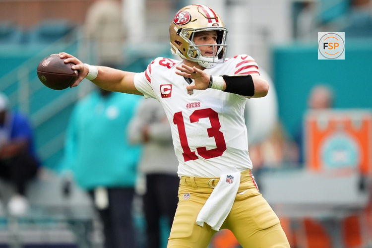Dec 22, 2024; Miami Gardens, Florida, USA; San Francisco 49ers quarterback Brock Purdy (13) warms up prior to the game against the Miami Dolphins at Hard Rock Stadium. Credit: Jasen Vinlove-Imagn Images