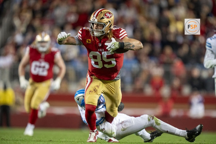 December 30, 2024; Santa Clara, California, USA; San Francisco 49ers tight end George Kittle (85) is tackled by Detroit Lions safety Ifeatu Melifonwu (6) during the fourth quarter at Levi's Stadium. Credit: Kyle Terada-Imagn Images