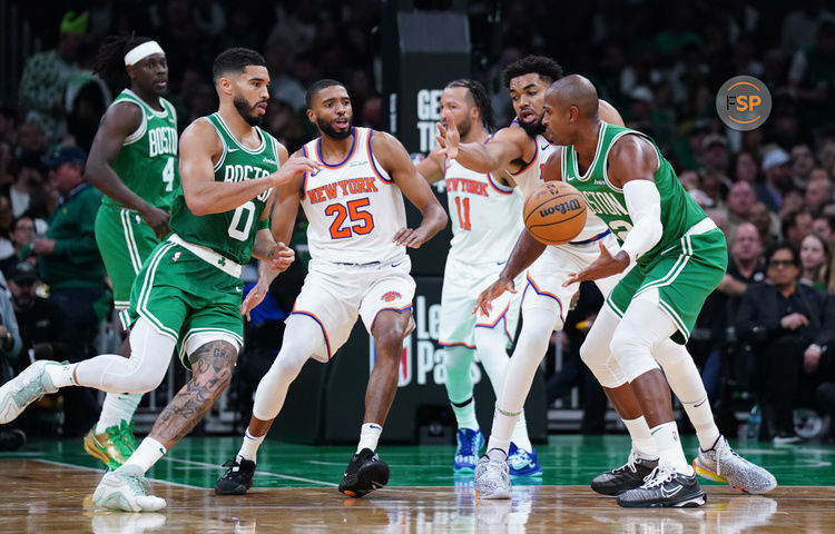 Oct 22, 2024; Boston, Massachusetts, USA; Boston Celtics center Al Horford (42) hands off the ball to forward Jayson Tatum (0) against the New York Knicks in the second half at TD Garden. Credit: David Butler II-Imagn Images